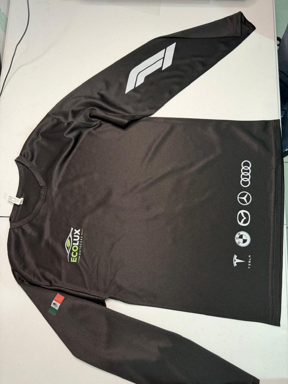 Playera deportiva dryfit negra de manga larga, 100% poliéster, personalizada con logotipo Ecolux y estampado en manga